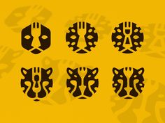 four black and yellow masks on a yellow background with an animal's head in the middle