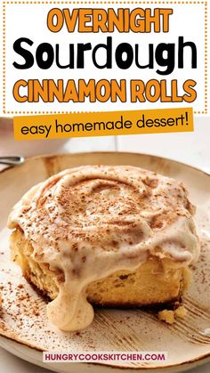 a cinnamon roll on a plate with the title overlay reads overnight sourdough cinnamon rolls easy homemade dessert