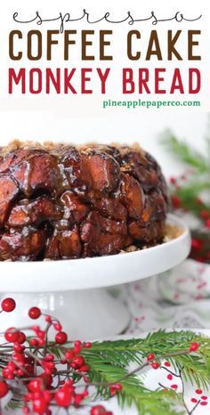 coffee cake monkey bread on a white plate with holly wreaths and red berries in the background