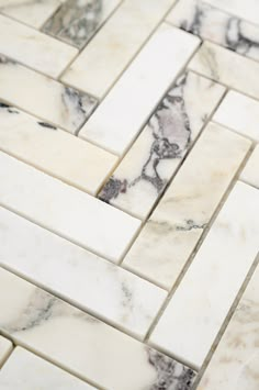 white and black marble tile on the floor