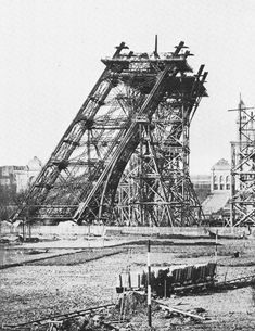 an old black and white photo of the eiffel tower