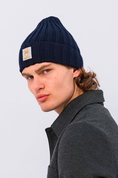 Upgrade your cold-weather style with our Men's Fit Beanie Hat. Crafted from soft, stretchy fabric, this beanie offers a snug and comfortable fit, ensuring warmth and comfort during the chillier months. Its sleek design makes it versatile enough to pair with any outfit, from casual streetwear to more rugged outdoor gear. Whether you're hitting the slopes or just keeping cozy on a cold day, this beanie is the perfect combination of fashion and function. Ideal for everyday wear, it's a winter essential for any wardrobe SIZE + FIT Tailored fit, to find your correct size use the ''what's my size '' button. COMPOSITION 70% Acrylic 30% Cotton Made in Turkey CARE Machine wash cold with similar colors STYLE #: 9003 Navy Casual Winter Hats, Navy Casual Beanie Hat, Navy Cotton Winter Hat, Winter Navy Cotton Hat, Navy Cap For Winter, Navy Winter Cap, Navy Hats For Winter Cold Weather, Cold Weather Fashion, Men Fits