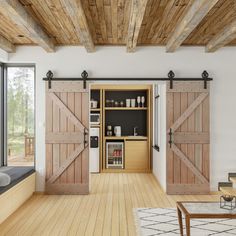 a living room filled with furniture and sliding doors