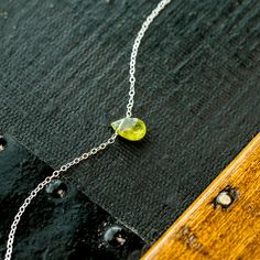 Peridot Necklace, August Birthstone Necklace, raw peridot necklace, peridot pendant, crystal peridot pendant, raw peridot jewelry A raw Peridot necklace that is so simple and dainty.  A genuine raw Peridot pendant is strong on a dainty chain to create an elevated yet simple August birthstone necklace. ♥ LIZBETH JEWELRY CO. BIRTHSTONE COLLECTION♥ →AUGUST Give this Peridot necklace as the perfect dainty gift for that special person in your life. Or, treat yourself (you deserve it♥) with this daint Lime Green Peridot Necklace For May Birthstone, Lime Green Necklace For May Birthstone Gift, Lime Green Necklace Gift For May Birthstone, Gift Peridot Faceted Necklaces, Faceted Peridot Necklaces For Gift, Faceted Peridot Necklaces As Gift, Lime Green Gemstone Necklace For Gift, Peridot Gemstone Necklaces, Teardrop Peridot Jewelry For May Birthstone