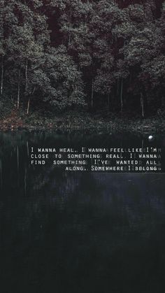 a lake with trees in the background and a poem written on it that says, i wanna