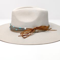 Gorgeous hat band for any style hat. Easy to interchange with all of your hats. A great addition to your look! This hat band is 17 inches long not including the ties. SKU: #0209-2351 Beaded Hat Bands Hats, Cheap Fitted Hat Bands For Country Events, Luxury White Hat Bands, Cheap Pink Western Hat Bands, Beaded Hat Bands Alcohol, Hat Bands Diy Ideas, Western Hat Bands, Cow Print Hat, Embellished Cowboy Hat