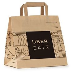 a brown paper bag with the words uber eats on it