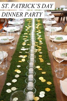 a long table is set with plates and place settings for guests to sit down at