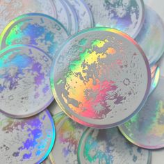 a pile of holographic discs sitting on top of each other