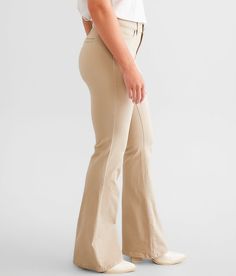 BKE Payton Flare Stretch Pant - Khaki 30/32, Women's Khaki Mid-rise Slightly eased through the hip and thigh 21 flared bottom opening Faux back welt pockets. 58% Cotton 39% Polyester 3% Spandex. Machine wash separately cold water. No bleach. Tumble dry low. Warm iron. Apparel & Accessories > Clothing > Pants Khaki Pants Women, Pant For Women, Birthday Stuff, Tan Pants, Womens Khakis, Clothing Pants, Bootcut Pants, Accessories Clothing, Stretch Pants