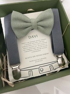 a bow tie and suspenders are in a box