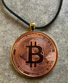 Fun Bitcoin .999 pure fine copper, 1 Troy ounce Coin hand-crafted pendant necklace encased in lead and nickel fee zinc alloy bezel tray.  Comes with 20-inch waxed cotton neck cord and pendant measures approximately 1.7 inches in diameter.  What a fun piece to add to your collection or for the BitCoin enthusiast!  Skillfully handcrafted in the US, each piece is authentically original and one of a kind.  Be sure to check out our other unique handcrafted creations made right here in the Grand Stran Coin Pendant Necklace, Coin Pendant, Waxed Cotton, South Carolina, Zinc Alloy, Necklace Etsy, Jewelry Necklace Pendant, Hand Crafted, Coin