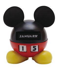 a mickey mouse alarm clock is shown with the numbers 1 - 5 on it's face