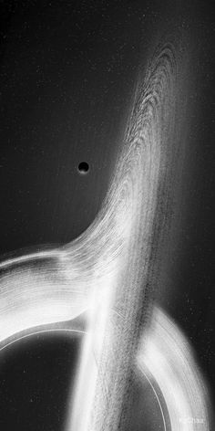 a black and white photo of a curved object in the air with light streaks around it