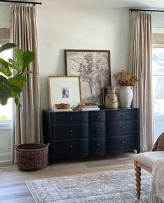 a living room filled with furniture and decor