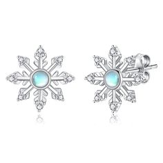 PRICES MAY VARY. The Snowflake Moonstone stud earrings will be a perfect accessory for the holiday season and makes a festive finishing touch to every winter outfit. Spread some winter cheer with this frozen snowflake design earrings. Snowflake is the messenger of winter, designed with moonstone makes this earrings much more elegant and dainty.Give these snowflake stud earrings to someone you loved as a unique Christmas or winter gifts. MATERIALS:The earrings are made of 925 sterling silver,it's Romantic Blue, Frozen Snowflake, Female Earrings, Winter Gifts, Snowflake Design, Writing Gifts, Blue Snowflakes, Moonstone Earrings, Design Earrings