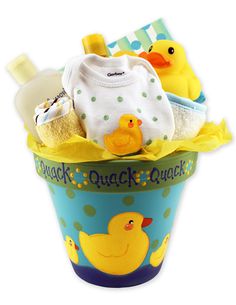 a baby's gift basket with rubber ducks