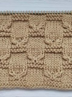 a close up of a knitted piece of cloth