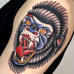 an image of a tattoo design on the side of a woman's arm with a lion