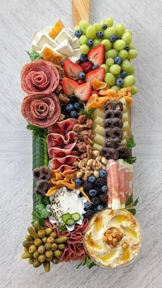 an artfully made out of fruits, vegetables and meats