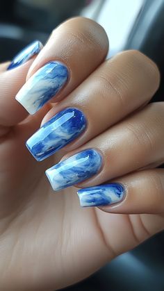 Blue Marble Effect nails create a stunning, artistic look with their swirled, elegant patterns. This design adds a touch of sophistication and flair to your fall manicure. Click the pin and follow us for more creative nail ideas! #FallNails #MarbleNails #BlueNails #NailArt #NailInspo Marble Effect Nails, Blue Marble Nails, Creative Nail Ideas, Navy Nails, Fall Nail Ideas, Navy Blue Nails, Gold Hair Colors, Marble Nail Designs, Fall Manicure