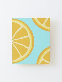 an orange slice on a blue and yellow background