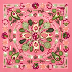 an image of fruit and vegetables arranged in a circle on a pink background with green leaves