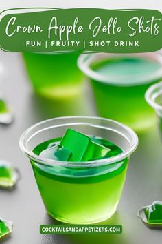 green jello shots in plastic cups with ice cubes on the side and text that reads, cron apple jelly shots fun / fruit shot drink