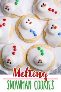 snowman cookies with white frosting on a plate