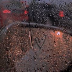 rain drops on the windshield of a car