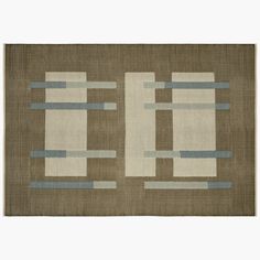 a brown rug with blue and white lines on it