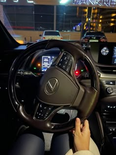 the interior of a car with dashboard lights and electronic display on it's dash