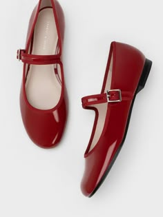 Featuring a glossy patent red finish, these buckled Mary Janes will inject colour and fun into your everyday ensembles. From the familiar feminine silhouette to the comfortable adjustable front straps, these stylish shoes have all the makings of a classic you'll want to wear on repeat. Style them with a little black dress, a statement microbag and a red lip for top marks. Charles And Keith Shoes, Red Mary Jane Shoes, Red Shoes Flats, Shoes Png, Feminine Shoes, Mary Jane Shoes Flat, Classy Shoes, Red Flats, Matching Baby