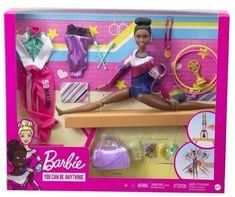 the barbie doll is sitting on a table with her hair and make - up accessories