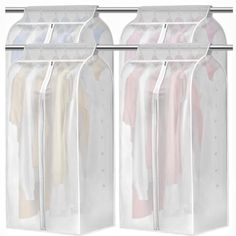 three clear plastic bags hanging on a clothes rack with four hangers attached to it