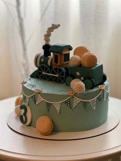 a birthday cake with a train on top