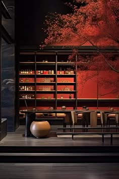 an empty room with tables and chairs in front of a large red painting on the wall