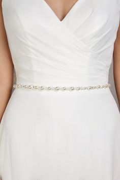 A gorgeous pearl sash, hand beaded with luxe pearls, sparkling crystals and silver diamantes. The decoration measures 71cm/28″ in length. Ties to fasten at the back with ribbon ties. Beaded Belt, Sparkling Crystal, Crystal Pearls, Hand Beading, Pearl Beads, Crystal Beads