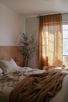 Earthy Bedroom Decorated With Linen Curtains Curtains For Earthy Bedroom, Earthy Tone Curtains, Natural Linen Curtains Bedroom, Boho Bedroom With Curtains, Airy Earthy Bedroom, Earthy Curtains Bedroom, Bedroom Aesthetic Earth Tones, Linen Curtain Bedroom, Light Brown Curtains Bedroom