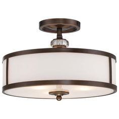 a semi flush light fixture with a white shade on the top and an antique bronze finish