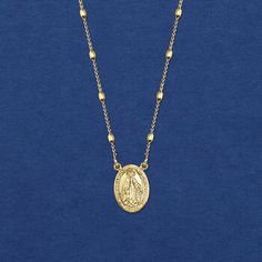 Ross-Simons - Italian 18kt Yellow Gold Over Miraculous Medal Beaded Station Necklace. 20". Based on a vision of the Holy Mother Mary, the Miraculous Medal is one of the most popular religious jewelry items of the Catholic faith. In gleaming 18kt yellow gold over sterling silver, this devotional pendant suspends from a cable chain lined with oval bead stations. Crafted in Italy. Lobster clasp, 18kt yellow gold over sterling silver Miraculous Medal necklace. Gold Miraculous Medal Necklace, Mother Mary Necklace, Miraculous Medal Necklace, Miraculous Medal, Station Necklace, Mother Mary, Religious Jewelry, Catholic Faith, Our Lady