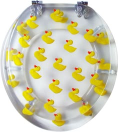 yellow rubber ducks are arranged in the shape of a circle on a clear plastic plate