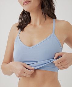 Women’s Everyday Shelf Bra Cropped Camisole 3-pack made with Organic Cotton | Pact Solid Camisole With Built-in Bra For Loungewear, Spring Tops With Built-in Bra For Relaxation, Solid Tops With Built-in Bra For Daywear, Cotton Tops With Built-in Bra And Medium Support, Camisole With Removable Bra Pads And Wide Straps, Tank Top With Built-in Bra For Loungewear, Solid Camisole With Bra-friendly Wide Straps, Bra-friendly Camisole With Tank Straps For Loungewear, Bra Friendly Camisole With Tank Straps For Loungewear