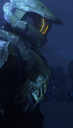 an image of a man in halo armor looking at the camera with city lights behind him