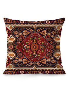 a red and blue pillow with an intricate design on the front, sitting on a white surface