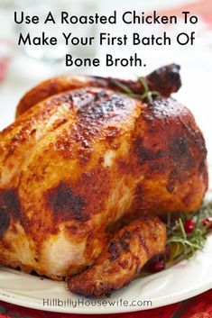 a roasted chicken on a plate with the words, use a roasted chicken to make your first batch of bone broth