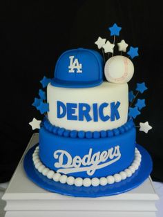 a dodgers cake is decorated with stars and a baseball on the top that says derrick