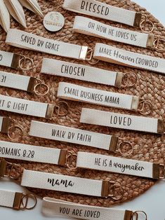 there are many different types of name tags on this placemat that is made from woven material