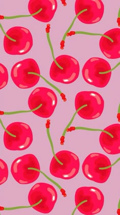 a pattern with cherries on a pink background