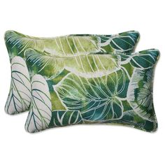 two green and white pillows with leaves on them